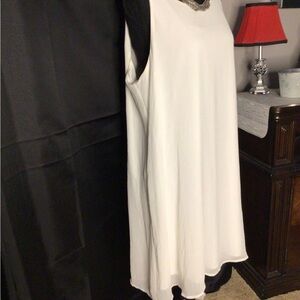 #712.  Tacera Asymmetrical Dress in White